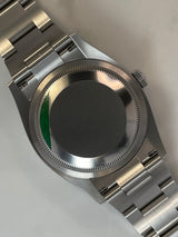 Rolex Datejust 126200 Palm Dial